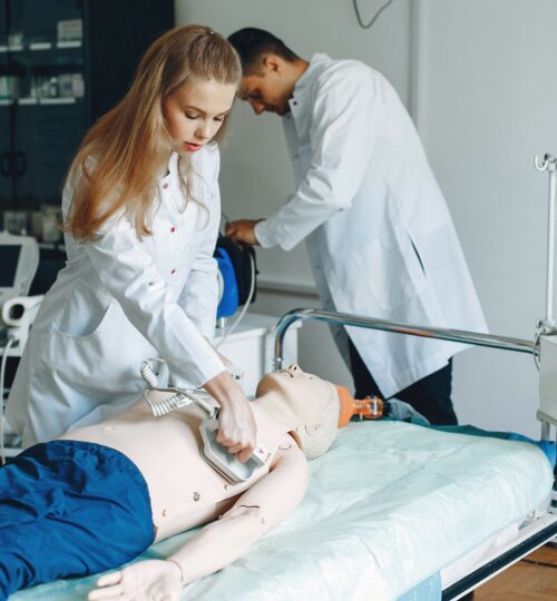 nurse-conducts-resuscitation-doctor-helps-woman-perform-operation-students-practice-medicine-scaled-1.jpg